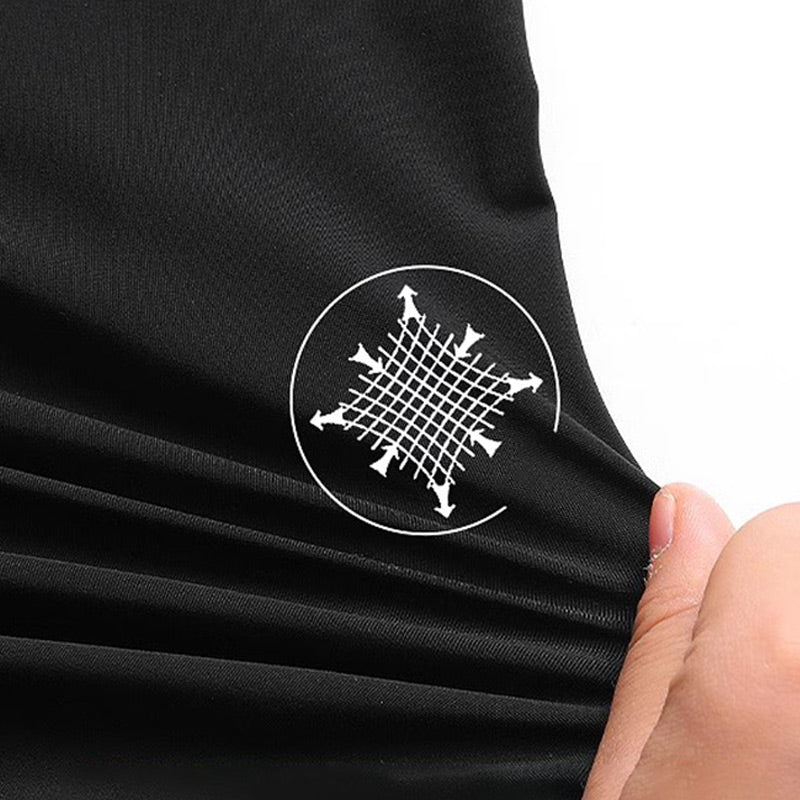 Pantalones cortos deportivos casuales elásticos transpirables de seda de hielo
