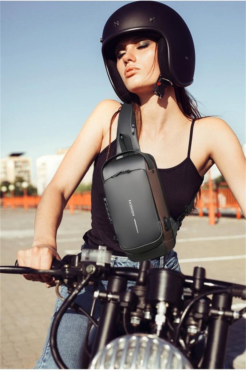 Bandolera antirrobo de piel con carga USB