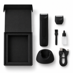 Recortadora con base de carga, cable USB, cabezal de repuesto, cepillo y frasco para aceite