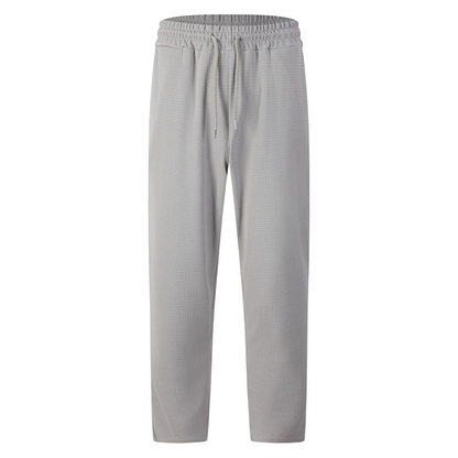 💥-50% AHORRO💥Pantalones casuales de punto gofrado con cordón para hombre