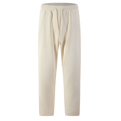 💥-50% AHORRO💥Pantalones casuales de punto gofrado con cordón para hombre